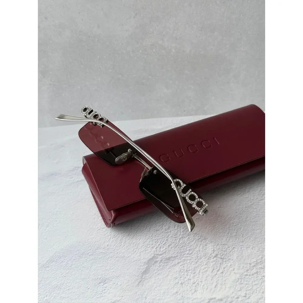 NEW Gucci GG1808S Silver Crystal Rimless Red Lens Sunglasses